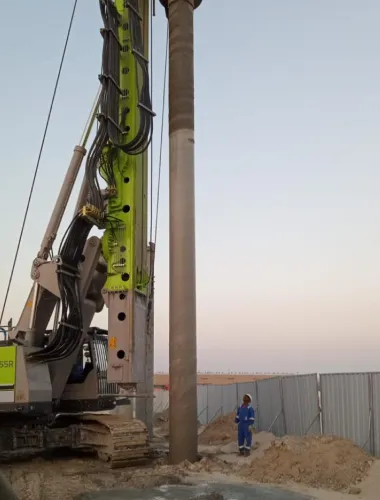 Close-up of an active CFA auger during pile drilling on an Interfix UAE site